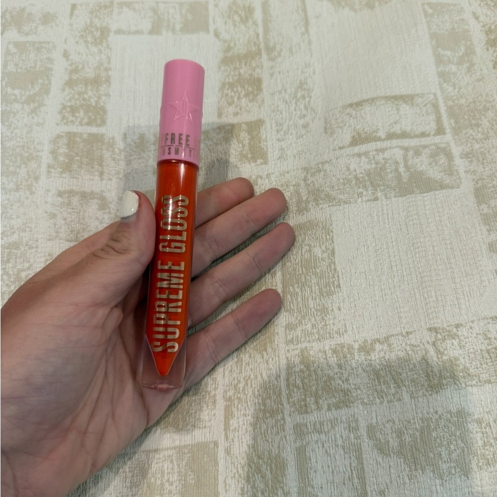 Jeffree Star Supreme Gloss Everybody Knows Red Orange  Gloss sold out host pick